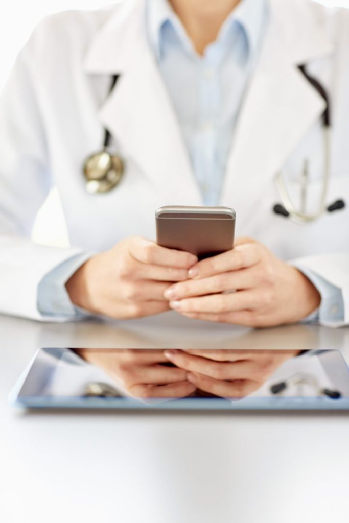 Secure Messaging for Healthcare providers- doctor texting