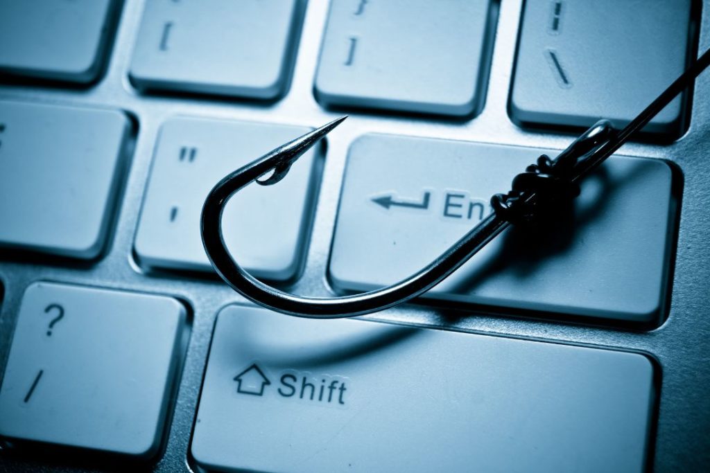 Phishing email scam hook and keyboard